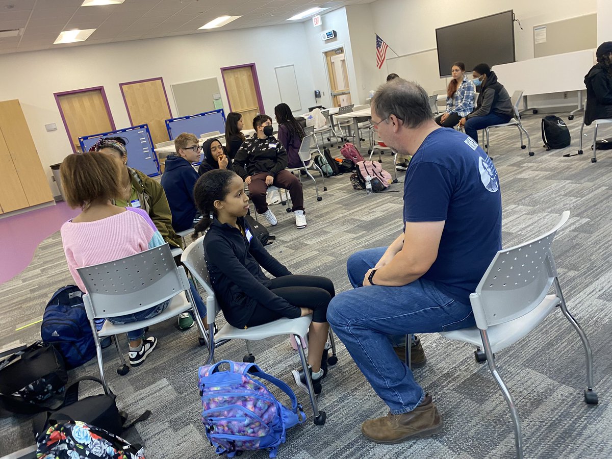 Coach_RCooper's tweet photo. Listening to our @NKCSchools youth plan for their #NKCSDiversityCouncil student leaders are focused on building belonging for EACH student. This requires thinking about who is at the table and who needs to be invited.🥰 No better way to wrap up the week!  ✌🏽❤️ https://t.co/HOcKVISext