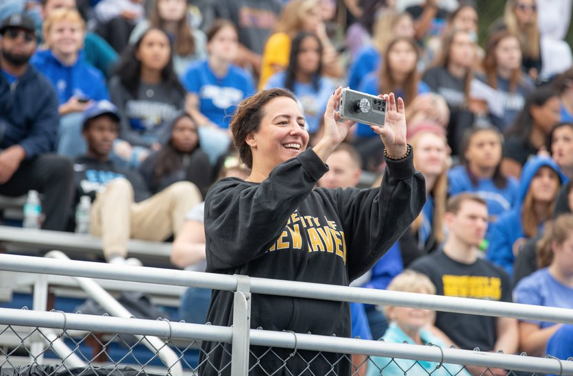 UNewHaven's tweet photo. Get your camera ready - tomorrow is #TheBlueout! Don't forget to tag us -@newhaven or #UNewHaven. See you back on the blue turf! https://t.co/ex2UamH8SI