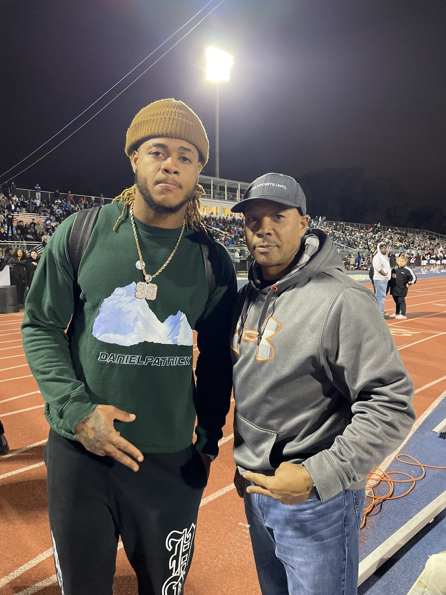 Chase Young '17 and Greg Steed '86 at tonight's football game.