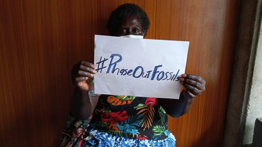 350Pacific's tweet photo. Solidarity from Solomon Islands. Our people are calling for #PhaseOutFossils- Rally behind our Brothers, Sisters and Leaders at #COP27. We need to see real climate ambition from high emitting nations to secure the safety of our people and the future of our island homes! ✊🏽🌎❤️ https://t.co/BlrmGyTX49