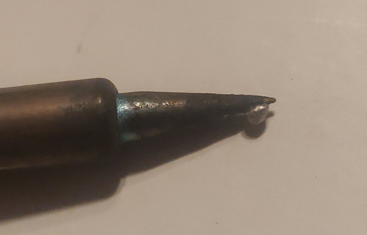 PartFusion's tweet photo. #Makevember 17: Cleaned the tip of my soldering iron. Used some copper and wood to clean most of the solids, then tip cleaner to try and renew the surface. I always try and leave a coating of solder to protect the tip.  Normally prefer a beveled tip instead of this conical tip. https://t.co/doWF6PHjhH