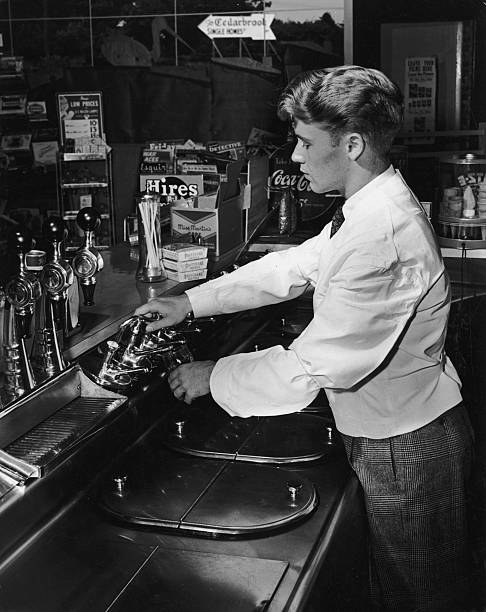 NotableHistory On Twitter A Young Soda Jerk Pumping Syrup Into A notablehistory-on-twitter-a-young-soda-jerk-pumping-syrup-into-a
