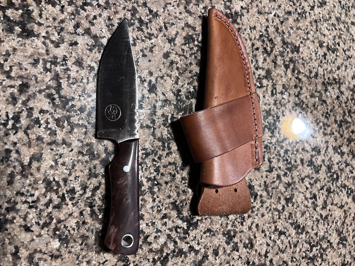 Spatialrain's tweet photo. One of the perks of having a wife that does blacksmithing. One of her blacksmithing buddies won Forged In Fire and I got one of his knives for my birthday.  He dropped it off last night. https://t.co/tuTo8Rj7lm