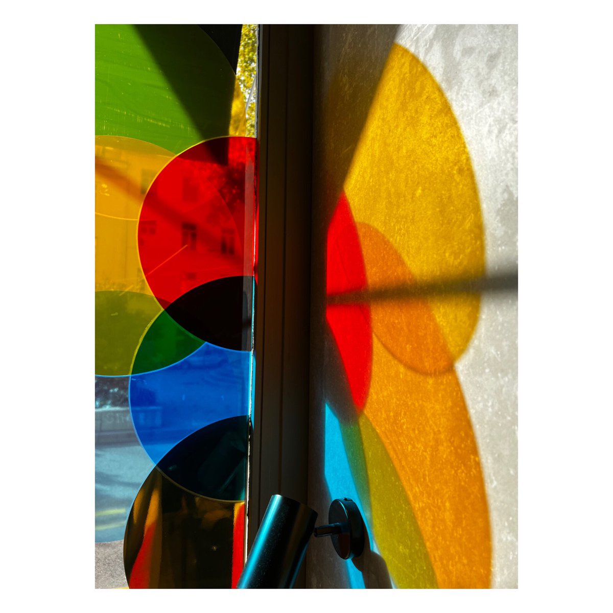 A glowing PAssAGE 1 - Radiant Auras - Fiona Grady’ beautiful new installation for The Eye Sees in #lyon on the windows of Summer, 1 Place Gailleton. @fiona_grady #art <a href="/BiennaleLyon/">Biennale de Lyon</a>