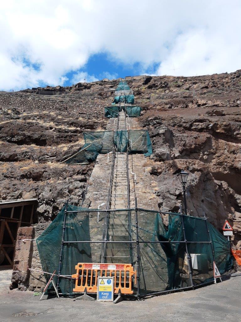 UKSHHeritage's tweet photo. Thanks to a generous donation from @LordAshcroft, work on repairing Jacob's Ladder - one of the Seven Wonders of #StHelena - is well underway and expected to be completed by the end of next month. #CulturalHeritage @sthelenatourism #uniquesthelena https://t.co/BxI3TJNl6B