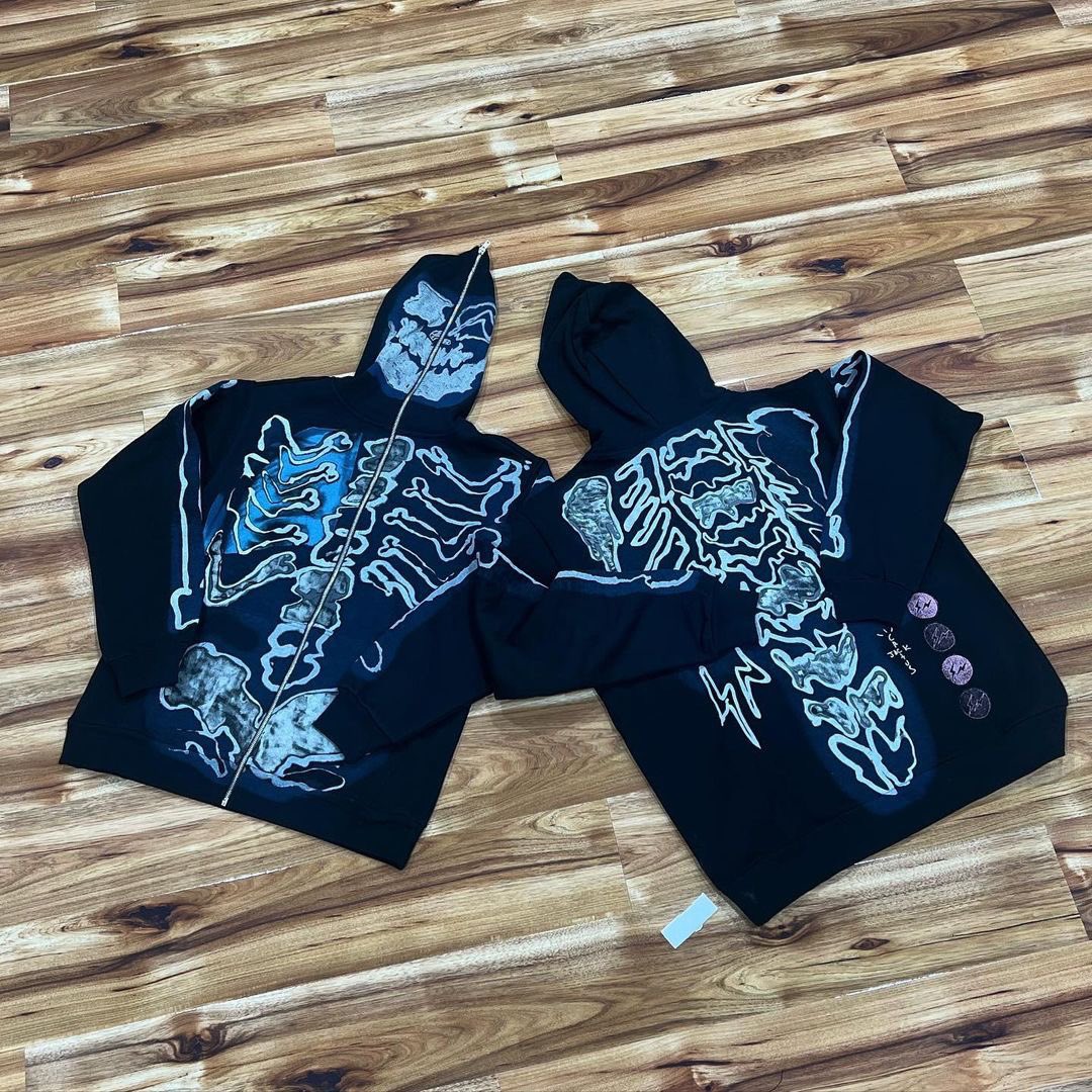 Travis Scott X Fragment Full Zip Skeleton Hoodie available in a Medium/Large for $199.99 each!