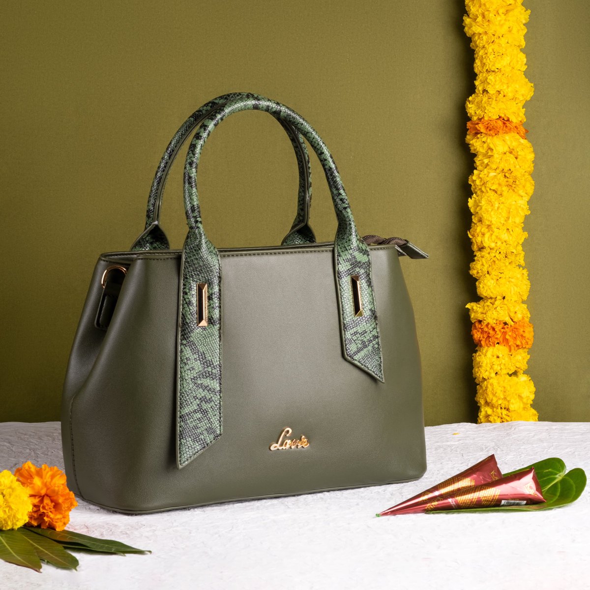 Mehendi lagake rakhna, #Laviebag sajake rakhna 😉 Comment 🛒 if you’re adding our #Rumba satchel to your cart! 
.
Shop the best of wedding range at an additional 20% off using code: LAVIEGLAM20 👜
.
#lavieworld #wedding #trending #mehendi  #handbags #love #onestopshop #explore