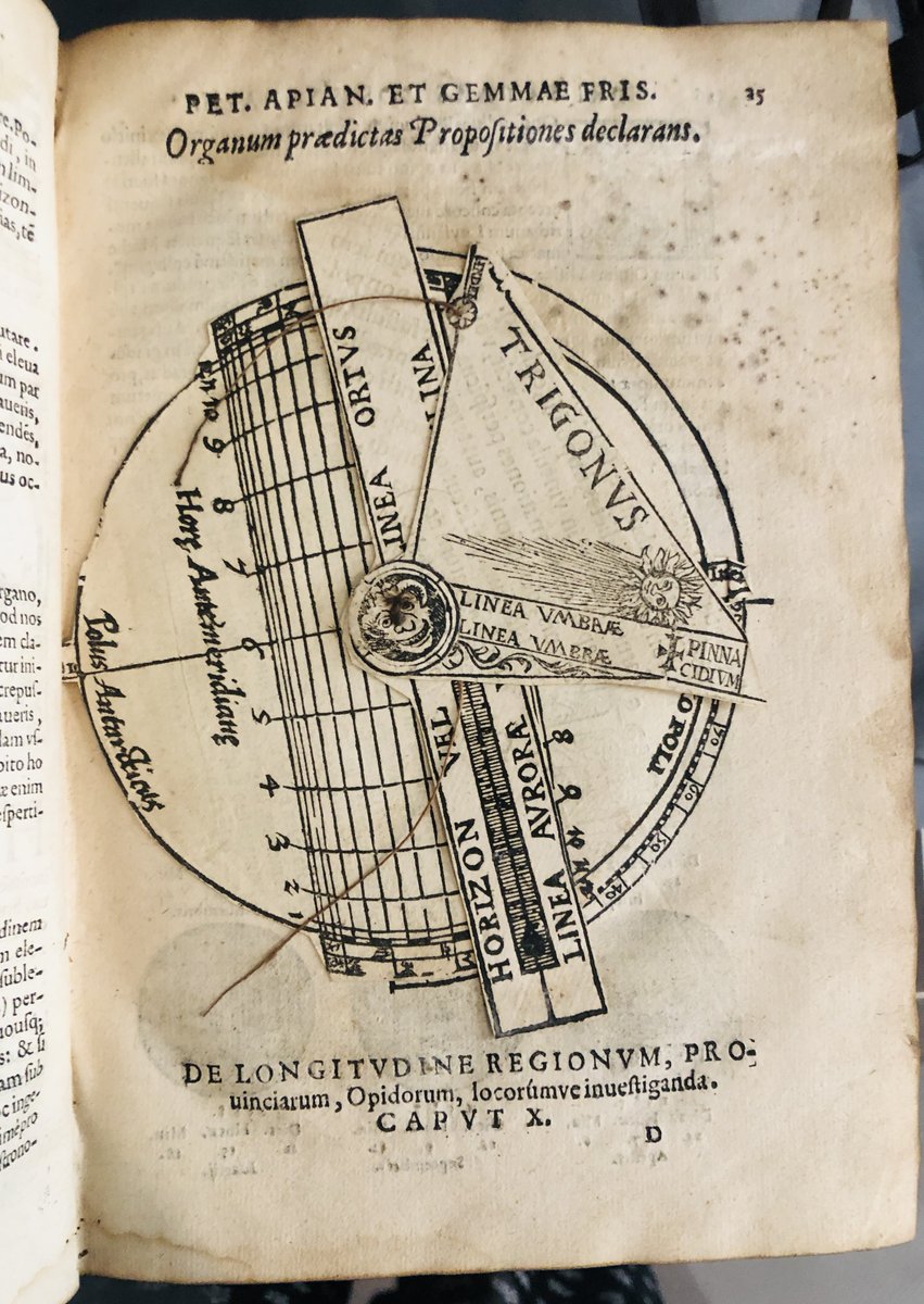 MarshsLibrary's tweet photo. Our #ScienceWeek2022 work on #ApiansWheels is done, and we've made about 150 replicas this week! The owner of this book didn't quite follow the instructions correctly. The small creature should have been stuck to the back of the page instead of the scrap paper here! #Volvelles https://t.co/fdoaGSzvgo