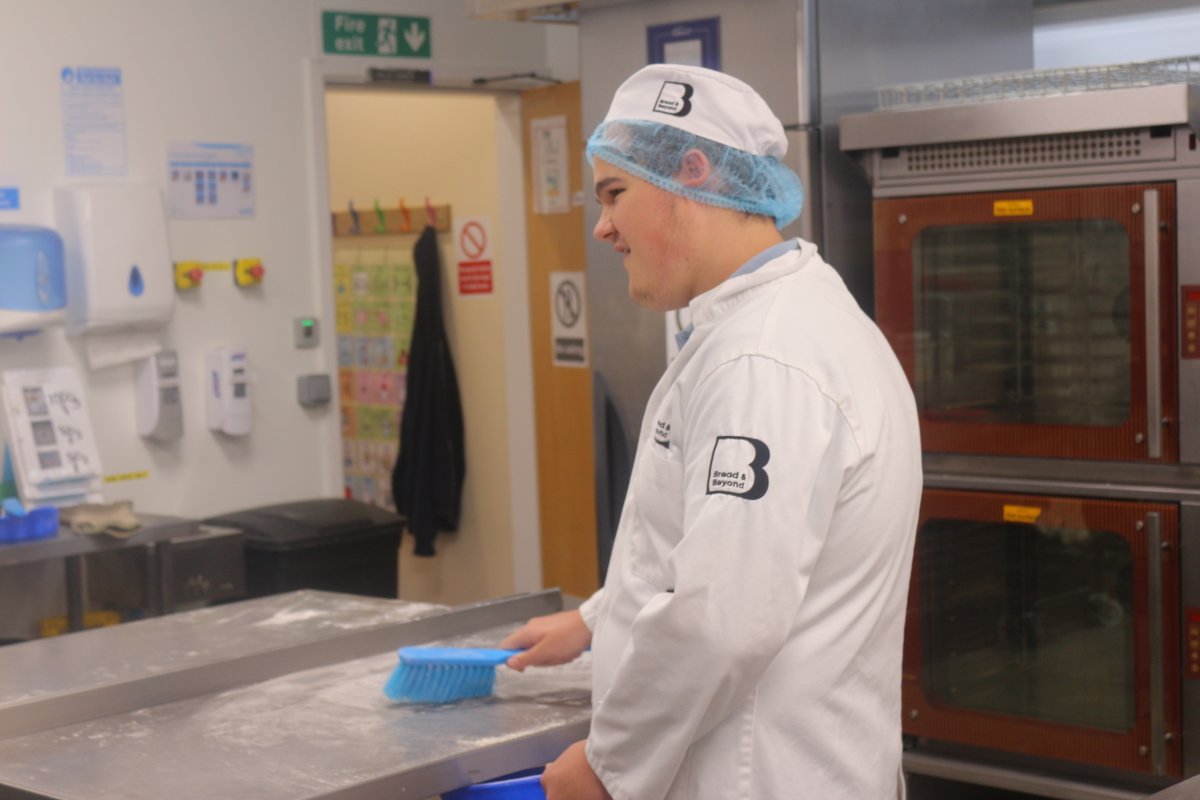 Meet our Trainee Baker, Kaylan.

Kaylan started in the bakery in 2022 and is just beginning his bakery journey. He is starting to develop all the basic skills he needs to know in a bakery and is enjoying learning new skills every week.