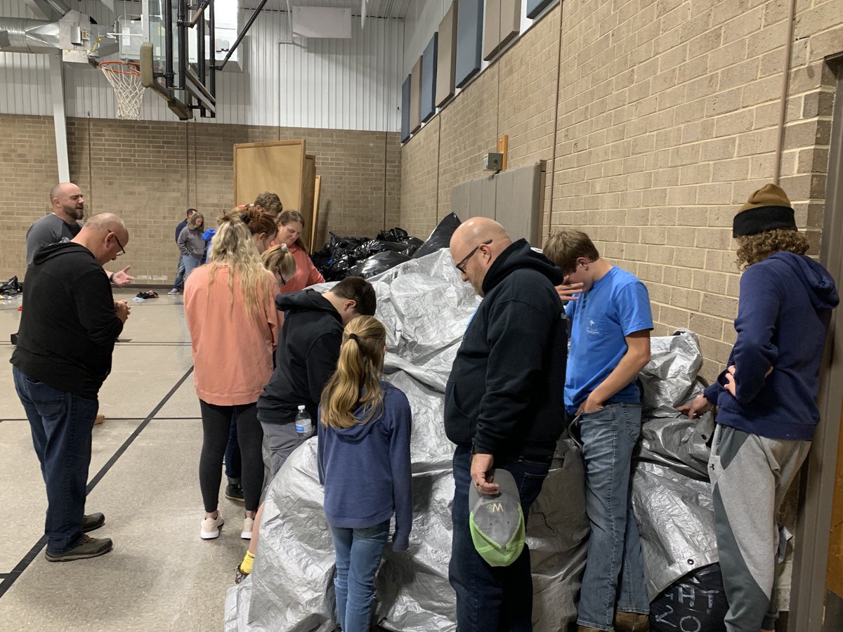 Volunteers praying over 4200 coats and 1200 sets of hats, gloves and scarfs donated by ⁦@SCBaptist⁩ and ⁦<a href="/ncbaptist/">NC Baptists</a>⁩ churches for Coats for the City - an evangelistic outreach thru ⁦<a href="/mnyba/">MNYBA</a>⁩ church planters in NYC.