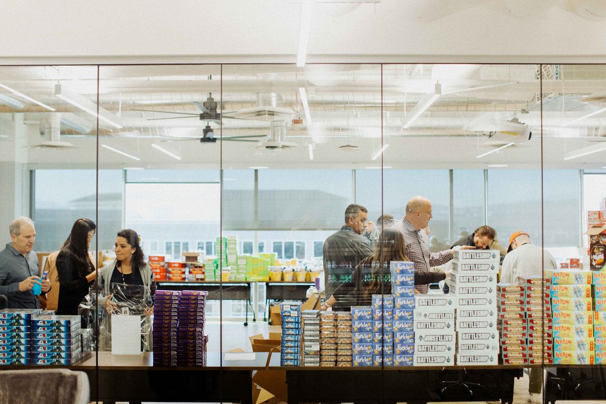 mX's tweet photo. This week, our @mX teammates took time in between meetings to put together more than 950 holiday gift baskets for @UtahFosterCare. Our late co-founder @abrandoned had a passion for helping foster families and we are grateful to build on his legacy this holiday season. #JustDewitt https://t.co/SWisZPvQwo