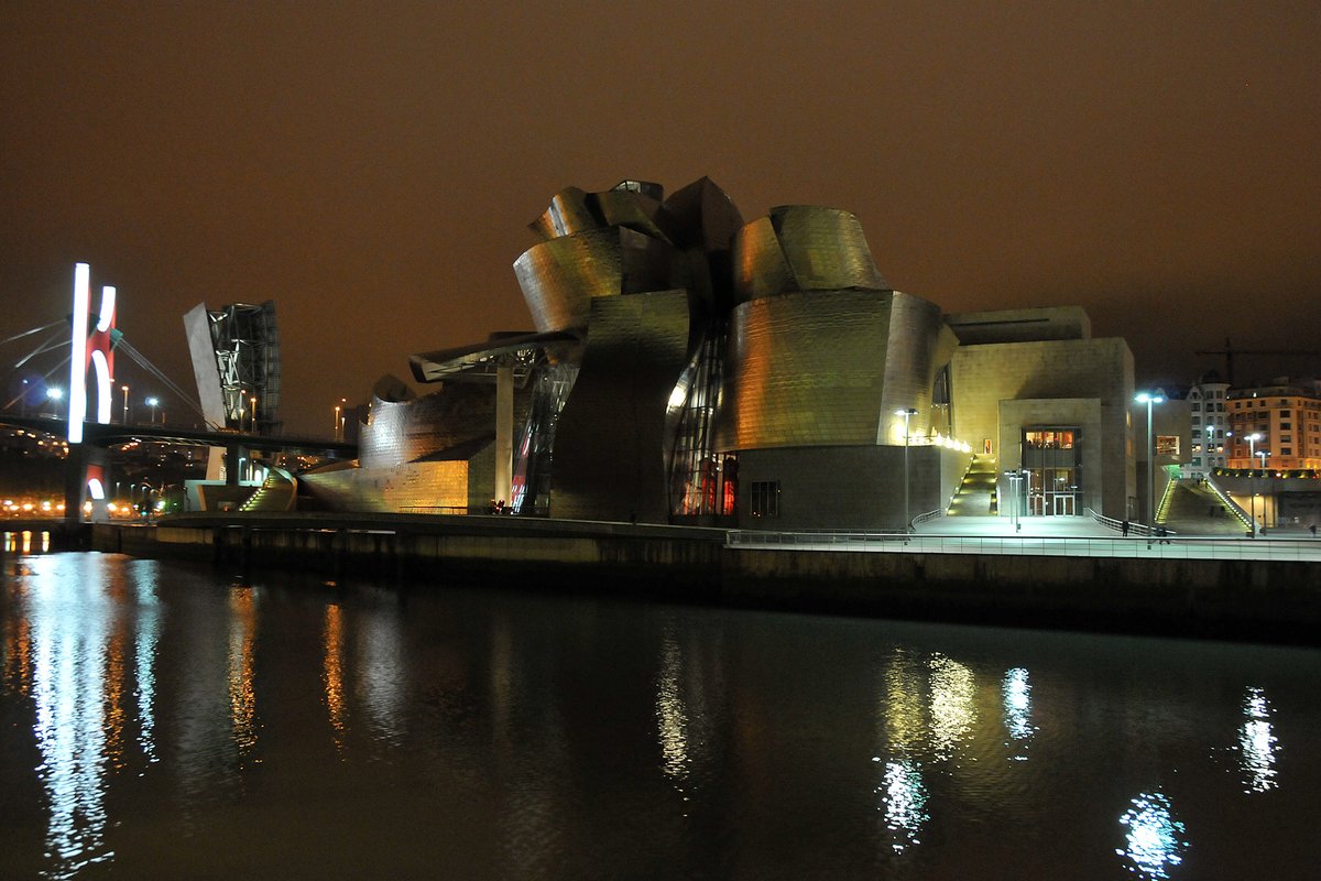 i_recordings's tweet photo. Happy 25th anniversary @MuseoGuggenheim Bilbao, a superb titanium covered museum by #thefrankgehry It helped rejuvenate the run-down port along the Nervión river, once a major steel making area - the majority of the low-phosphorous output was sent to Britain. #steel #artmuseum https://t.co/pbk1QyVI5o