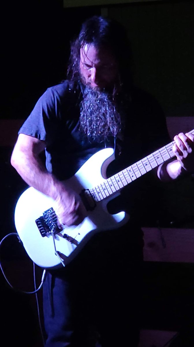 Ali3nJ's tweet photo. Hands so fast you can't catch them on camera. Guitarist Dave DeWeese shredding the six string. https://t.co/JpEwy0Axg6