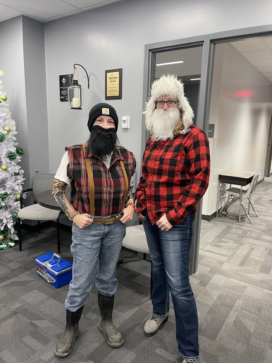LadogaPrincipal's tweet photo. We should probably win just because of these 3! Nurse Wendy, Secretary Wood, and Lit Coach KP! Bringing the lumberjack flannel today! #beardsup #channeltheflannel https://t.co/s0gXpDO3Cs