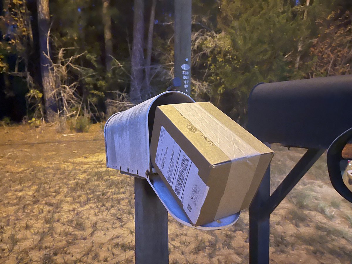 Way to go ⁦<a href="/USPS/">U.S. Postal Service</a>⁩. Stonewall, La. mail carrier let my package hang out all day like this, with my other mail behind it all exposed to the elements or sticky fingers. A 30 second drive could have had it at my door. 2 months ago a package was left ON TOP of the mailbox.