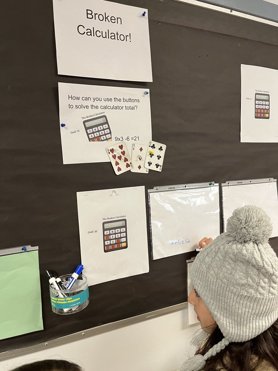 morikkey1's tweet photo. Broken Calculator task in the hallway grabbing many kids’ attention. Using vertical non permanent surfaces to record ideas. #thinkingclassroom #mathforlove #hallwaynumeracy @WestVanSchools https://t.co/jsOdb0SO06