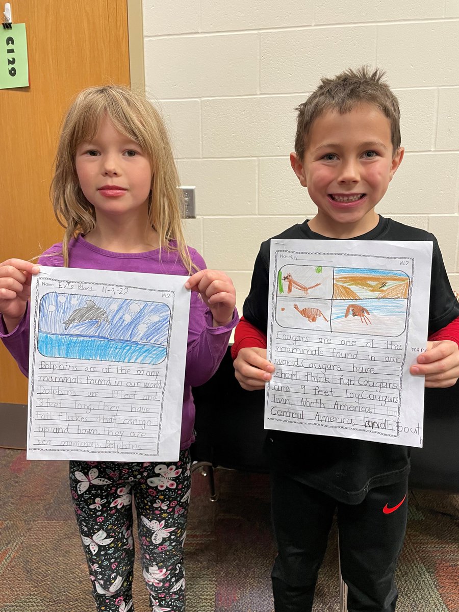 Evie and Roy came to the office to share their informative writing mammal research projects about Dolphins and Cougars! Great work kids! #TeamMES