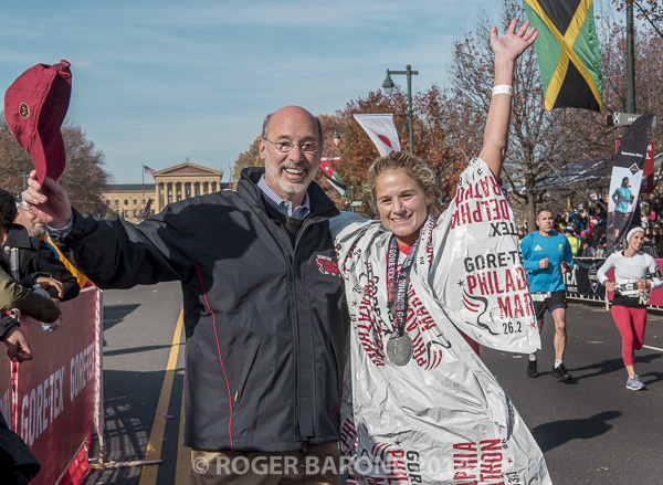 fotosfromphilly's tweet photo. Dr Erin Lally is greeted by Mayor Nutter (11-17- 13) &amp; Gov. Tom Wolf (11-23-14) after completing  @Philly_Marathon @_Nellie_Shields @shamdan95 @oppyseas @JeffersonAlumni @WIO_WomenInOpht @DelValNews https://t.co/K8Os9nHSfj