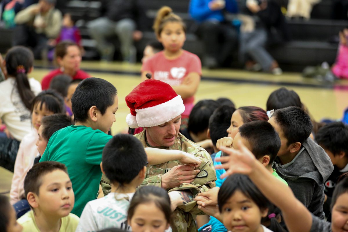 AKNationalGuard's tweet photo. Alaska National Guardsmen delivered tidings of good cheer with Mr. and Mrs. Claus to the north western community of Scammon Bay! #OpSanta 🤶🎅 https://t.co/JuLQEfyrE9