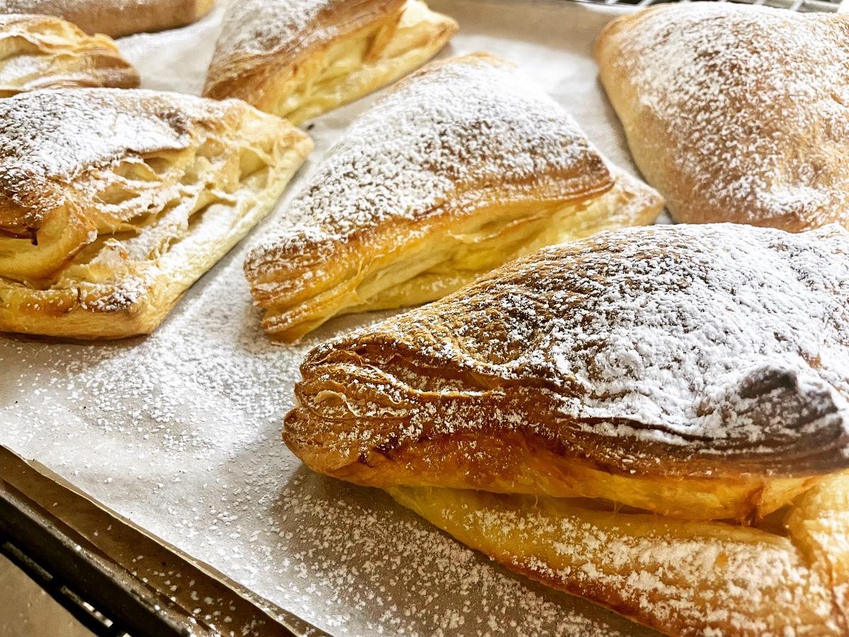 BakeryDannys's tweet photo. Evergreen apple turnovers proper Danish proper size $4 #dannysbread #dannysbakery #canberrabakery #canberrasourdough #cbrbread #cbrbakery #cbrsourdough #bestsourdough #canberrahotbake https://t.co/hTYLqE4v7X