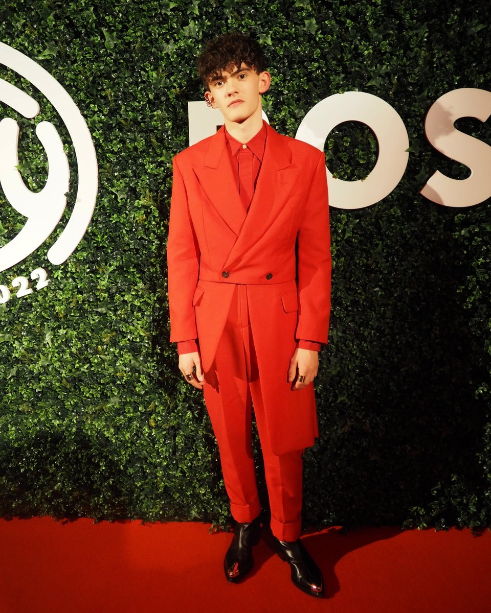 .@joelocke03 attends the #GQMOTY Awards in London wearing a cropped double-breasted tailored jacket and shirt in Welsh red. Finished with #McQueenPunk boots with a silver metal toe-cap and antique silver metal jewellery.

#SeenInMcQueen #GQAwards