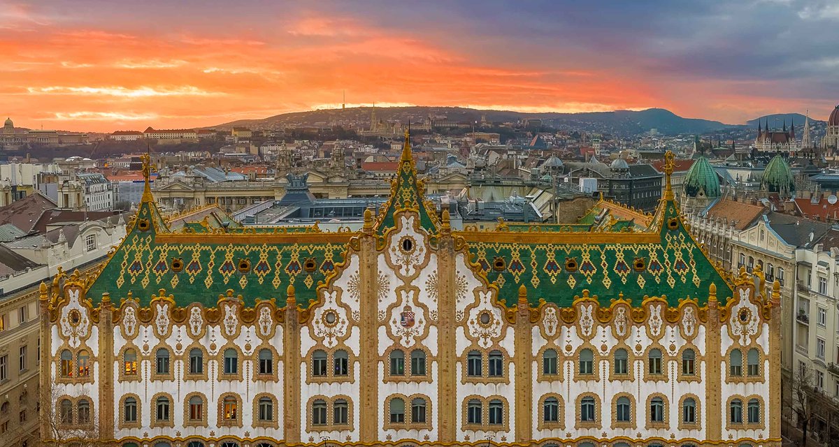Glorious photo of the Art Nouveau "Royal Postal Savings Bank" (currently housing the Hungarian State Treasury) in Budapest. Designed in 1901 by Hungarian architect Ödön Lechner.

Unfortunately I couldn't find the name of the photographer.