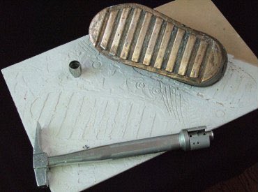 Alan Bean brought his geological hammer back with him even though it should’ve stayed on the Lunar surface. 
The hammer and Lunar dust were in many of his paintings / pieces.
He stipulated in his will that the hammer was to go to NASM as it was paid for by the taxpayers.