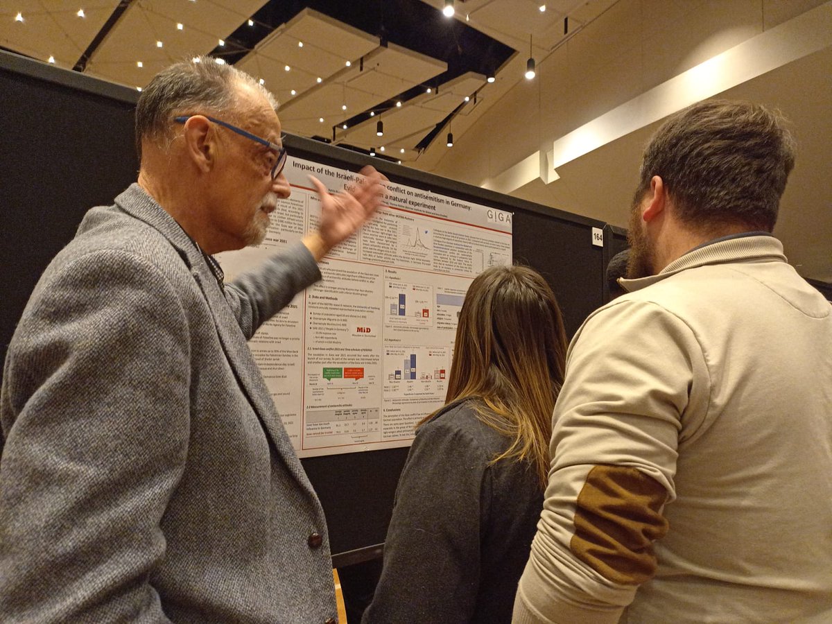 MOTRAVERBUND's tweet photo. Impressions from the poster session at #ASC2022 #ASC41, including a spirited discussion of our findings on the impact of the Israeli-Palestinian conflict on antisemitism in Germany. https://t.co/MTwWgJEp5c