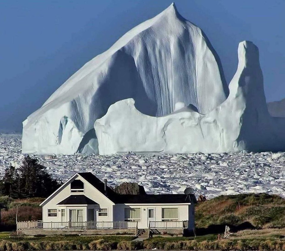 A 150 ft. Iceberg passes through Iceberg Alley, in Newfoundland, Canada.