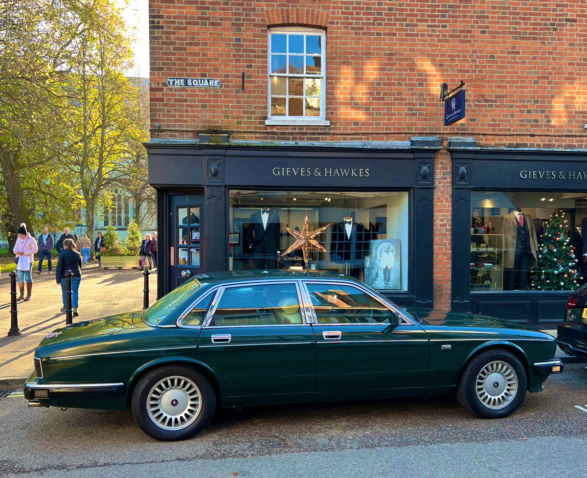 Almost perfect car spot; Winchester Cathedral, Gieves and Hawkes, classic Daimler parked outside… would quite like to waft around in one of those in G&amp;H outfits!