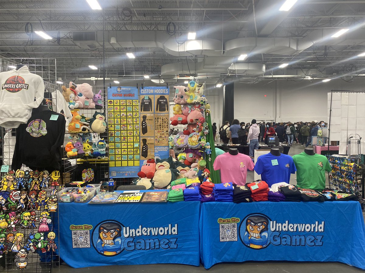 UnderworldGamez's tweet photo. Stop by the #underworldgamez booth and say hi. New pocket t-shirts on deck. New characters, Ridley, Steve, Roy, jigglypuff, falco, fox, dark samus, and bowser. #apex2022 #apex #vgbc #smashbros #ssbu #ssbm #ssbwiiu #SmashBrosUltimate https://t.co/DghWcAFX44