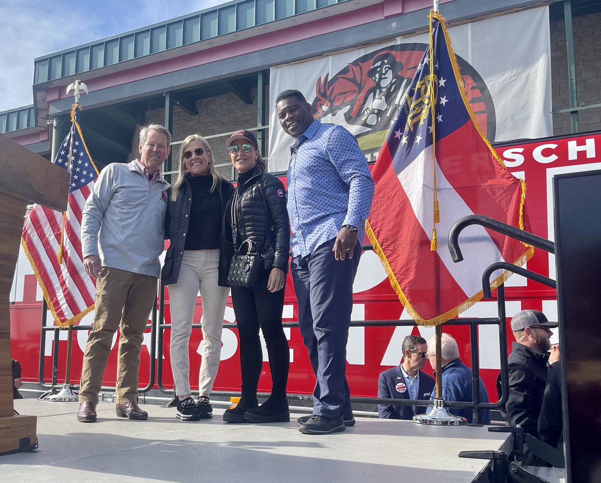 HerschelWalker's tweet photo. Great to have @BrianKempGA and @GAFirstLady join Julie and I today with a great crowd in Smyrna! The people are ready to evict Raphael Warnock on December 6th! #gasen #gapol #gasenrunoff https://t.co/YqJzd13WC7