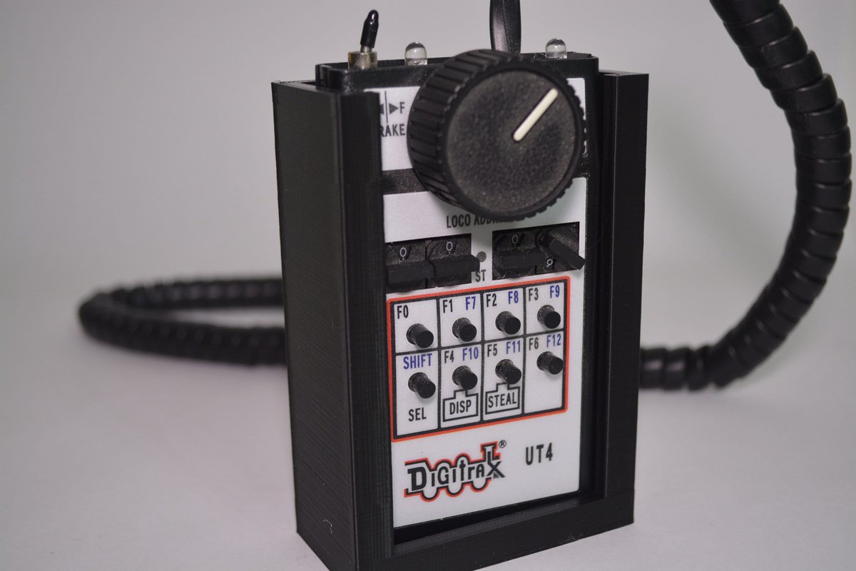 WorkshopPenguin's tweet photo. New exciting product at Penguin3DWorkshop: Digitrax DCC Throttle Holder https://t.co/IHXImABEbX #digitrax #modeltrains #dcc #3dprinted #3dprinting #throttle #nscale #hoscale #etsy https://t.co/ySs6UbvTrV