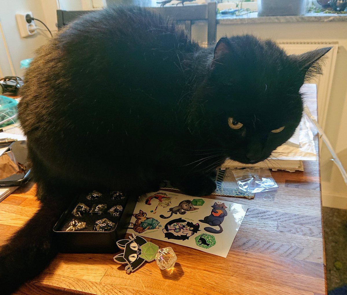 Sehvrin's tweet photo. My very pretty #Purryhedrals from @greenleafgeek arrived yesterday. Just in time for our DnD session today 😁 Unfortunately they rolled badly today (though no crit fail), but so did ALL my other dice too 😑 Only die who should not be ashamed today is the purryhedral D8 👍 https://t.co/GHnHJesLIr
