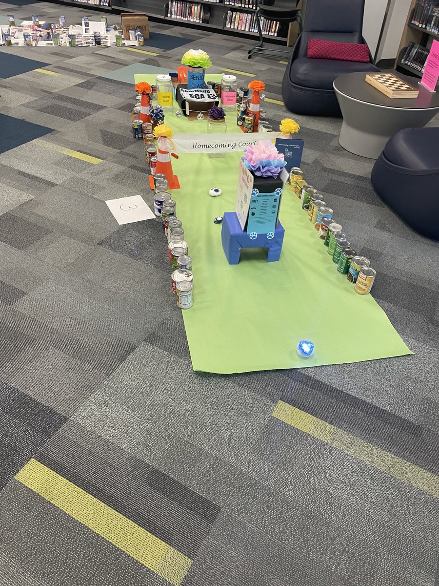 SCPSCHSLIBRARY's tweet image. Kicking off our 99 years of legos and food drive event today with a trial run! Students need to bring in canned food to drive a sphero through the obstacle courses