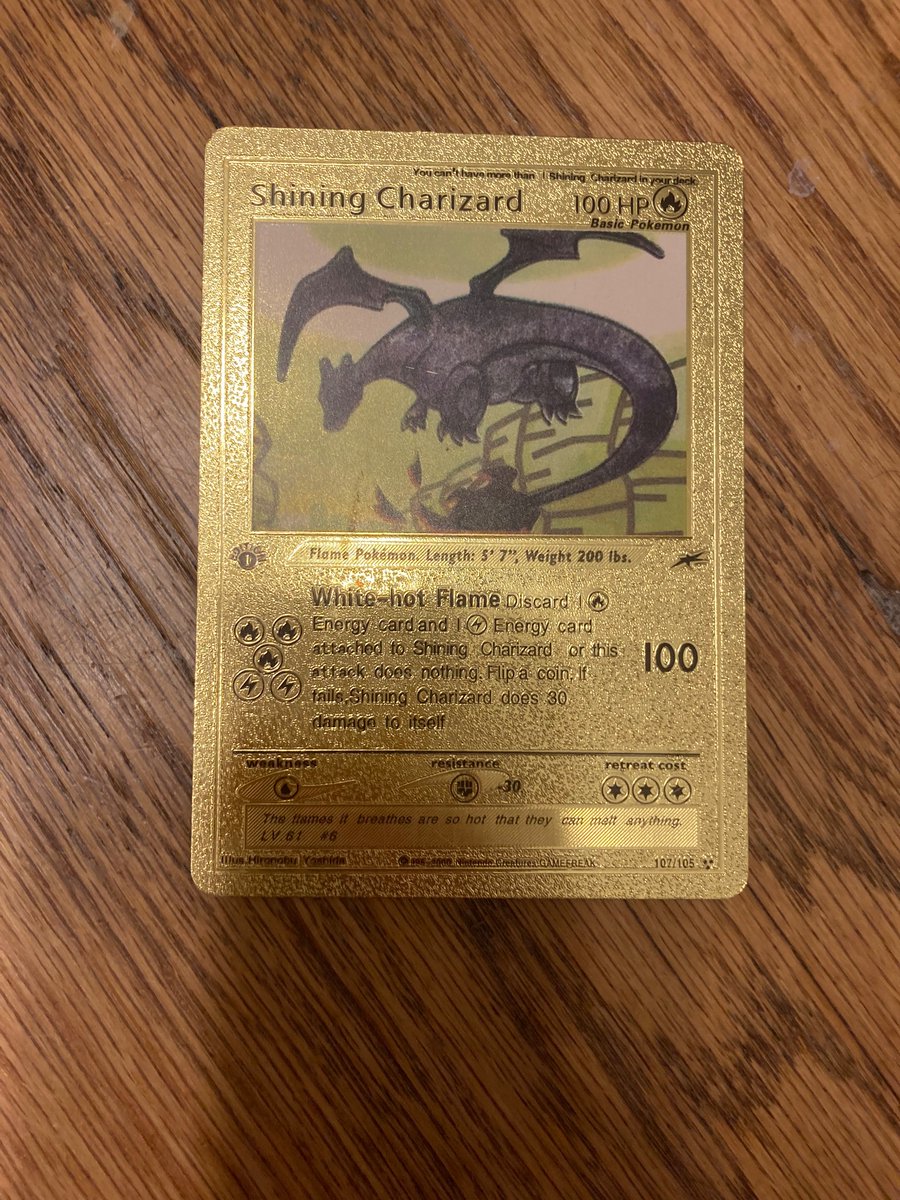 Elemonator21's tweet photo. @TheJWittz random question. My nephew has been trading Pokémon cards and ended up with a gold shining charizard. His dad wants to know if it’s worth something so he can give it back to the kid. Any help would be appreciated! https://t.co/d2i1voLXzI