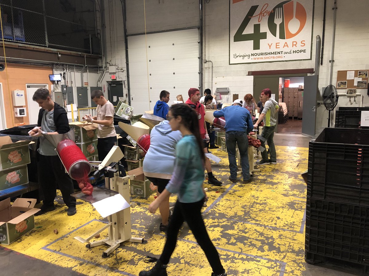 Packing over 4,000 lbs of sweet potatoes for Second  Harvest