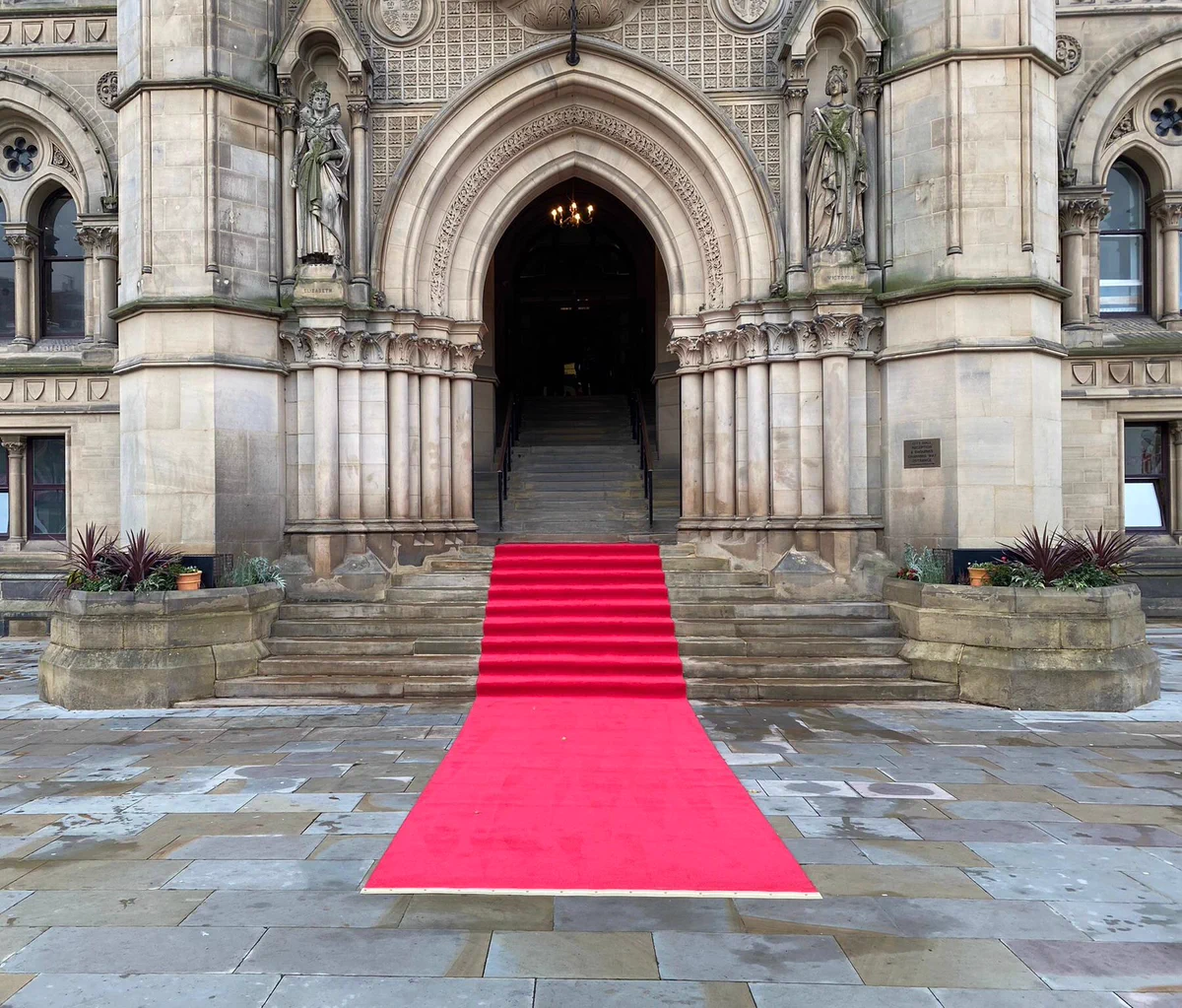 Red carpet being rolled out in Centenary Square, Bradford