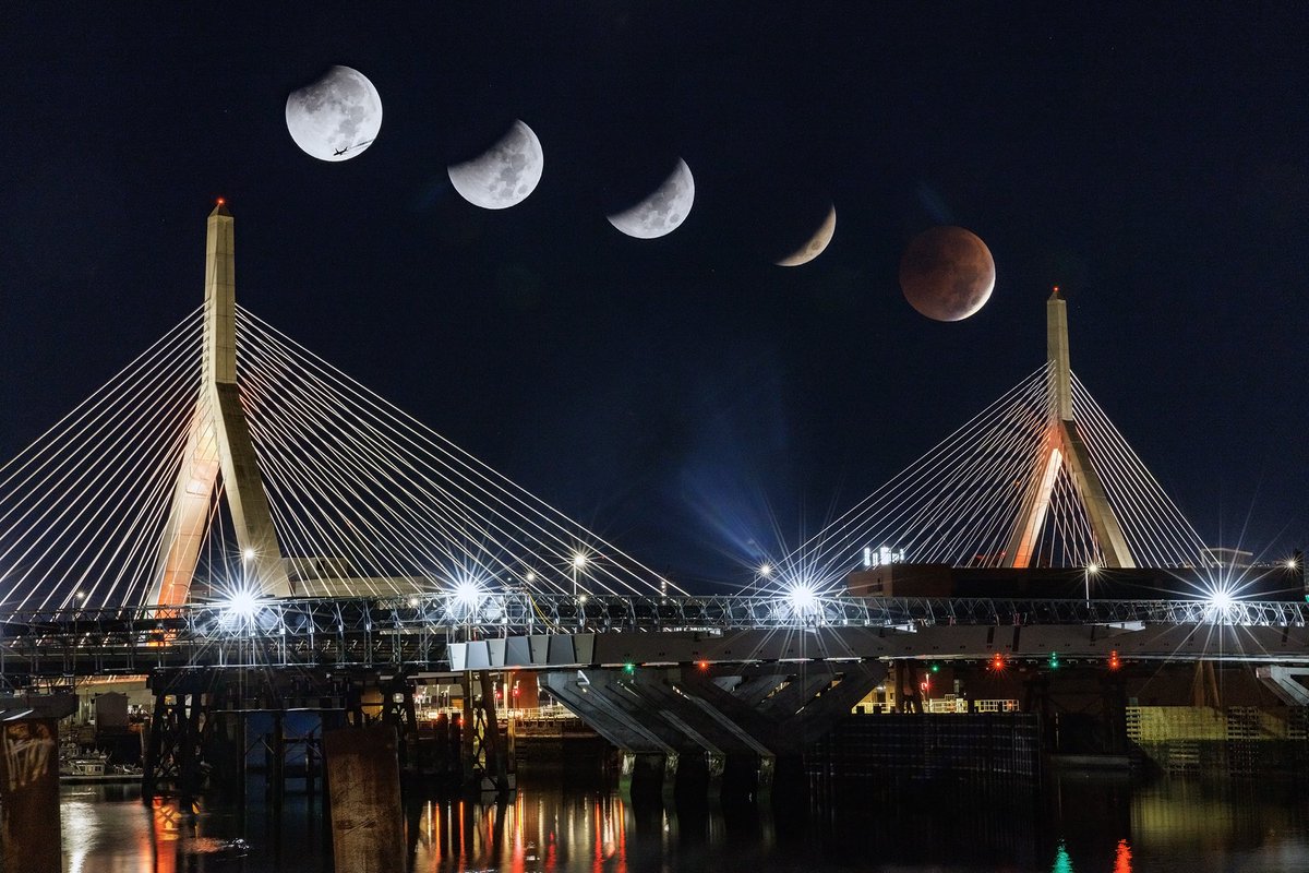 NBC10Boston's tweet photo. This morning’s #LunarEclipse is seen framed by #Boston’s Zakim Bunker Hill Memorial Bridge, in this 6 photo multiple exposure image. 📸📸⁦@pictureboston⁩ https://t.co/JbOIt1bunT