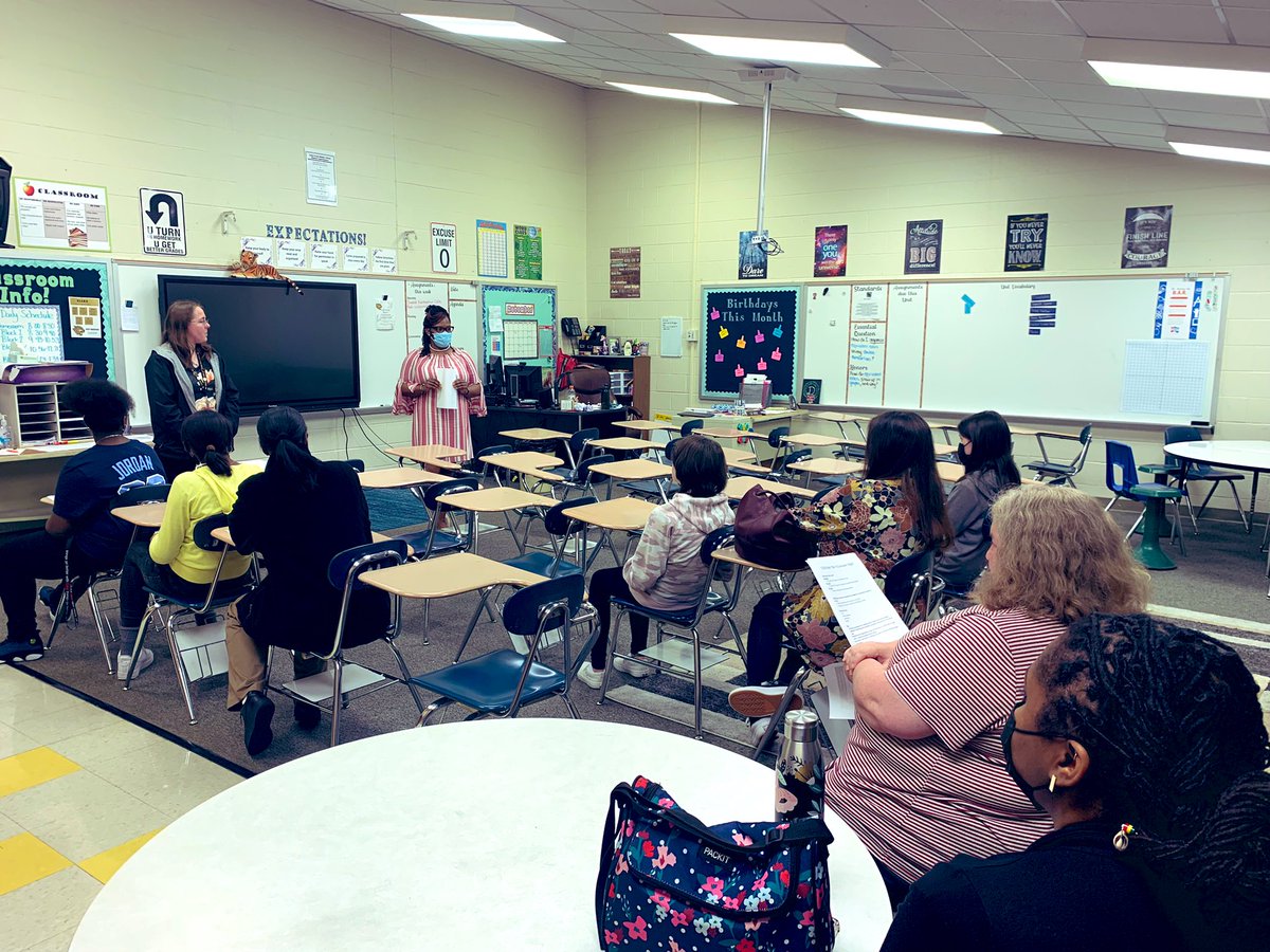 CCMS math teachers discussing vertical alignment, standard course of study and strategies to use at home at our first Curriculum Night of the school year.