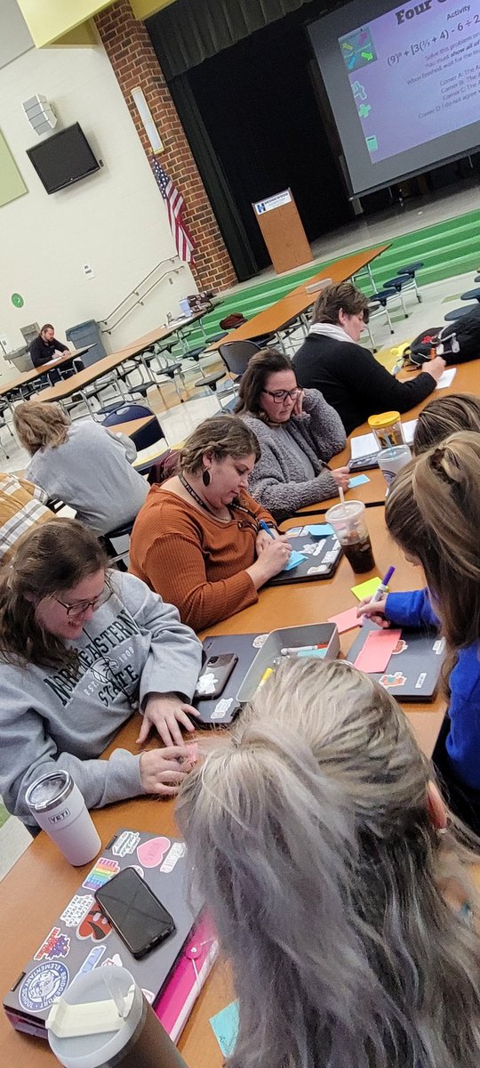 BGalbreath_HCSD's tweet photo. 5/6 grade teacher focused on solving a math problem during our Kagan Structure PD. Teachers were taking chances and talking about their learning! #BigBlueontheMove
#CollaborativeConversation
#TeacherLearners
#BestYearYet https://t.co/ZlRAY9Ln7c