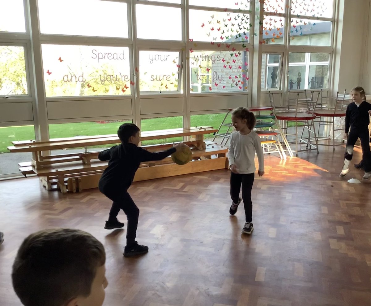 IPMATTowngate's tweet photo. #class3TPA enjoyed developing their ball skills today in #PETPA. They practised dribbling the ball and throwing and catching using chest pass and over head pass. https://t.co/m2Nvnr2hqM