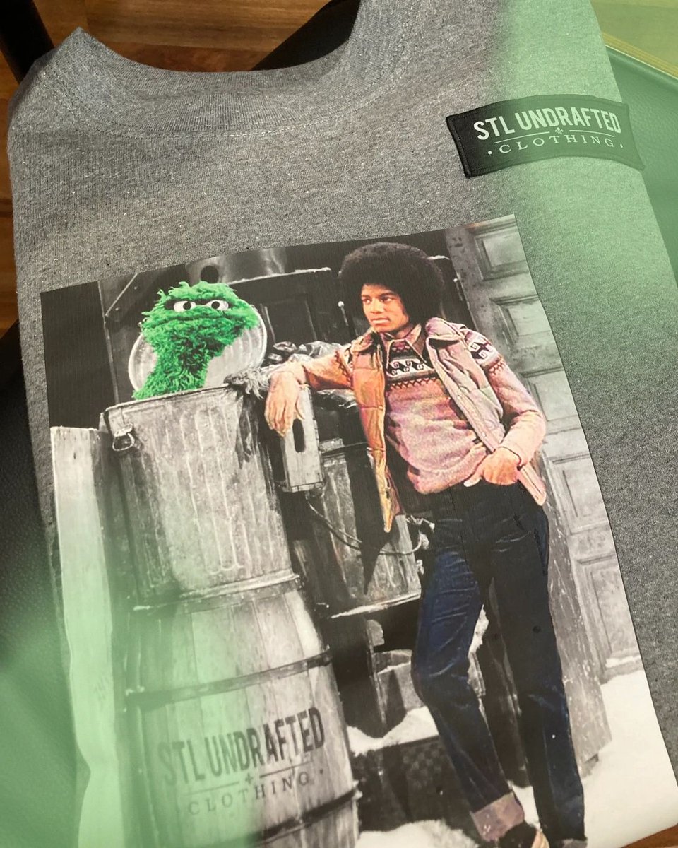 StlUndraftedClo's tweet photo. Check out our new crewneck sweatshirt featuring the king of pop and a vintage feel! Shop here: https://t.co/cY7cGUcSG7. https://t.co/x7UDFK6Zsl