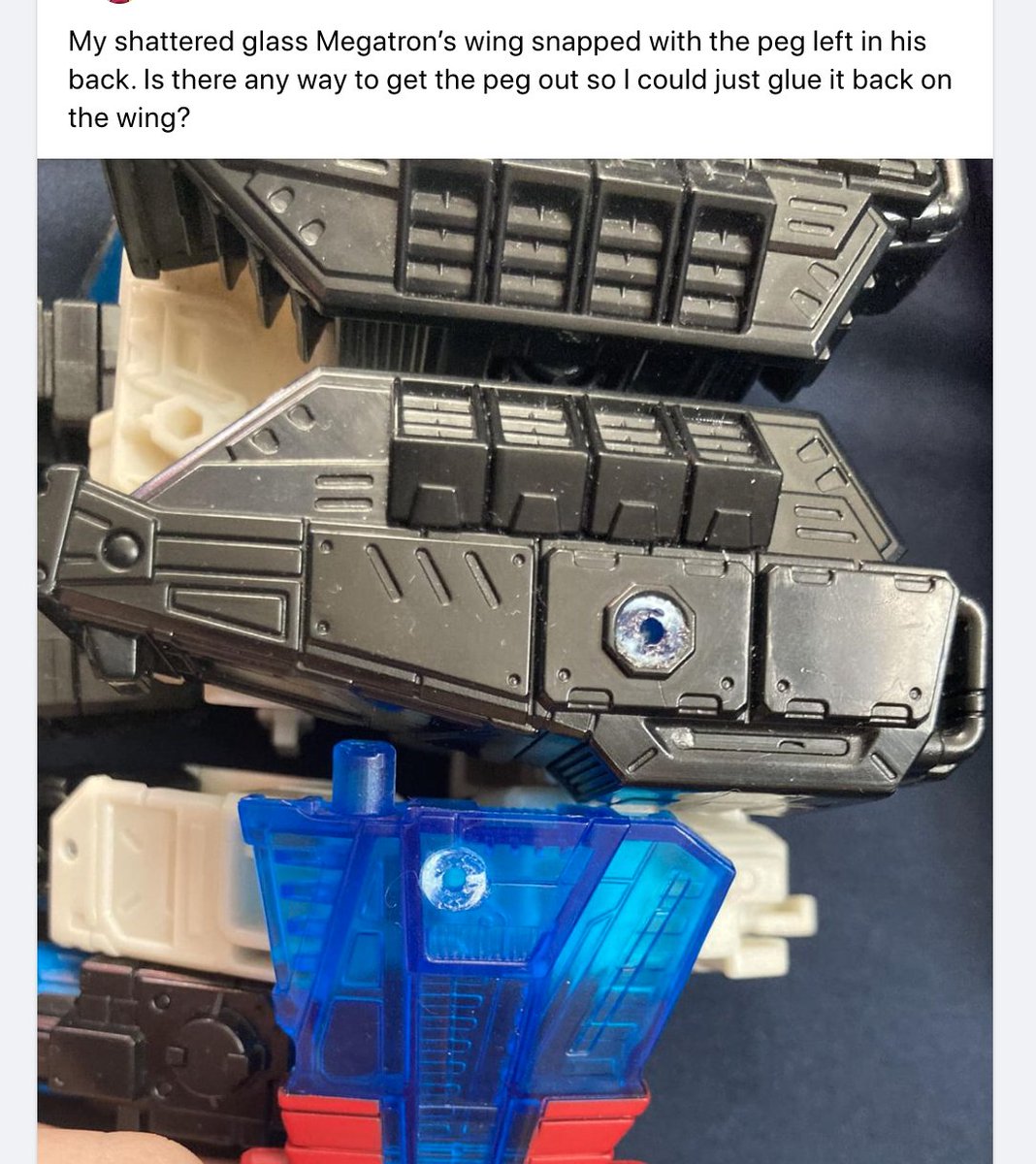 From Facebook, a Shattered Glass Megatron wing part loses its (translucent) 5mm peg to the void.