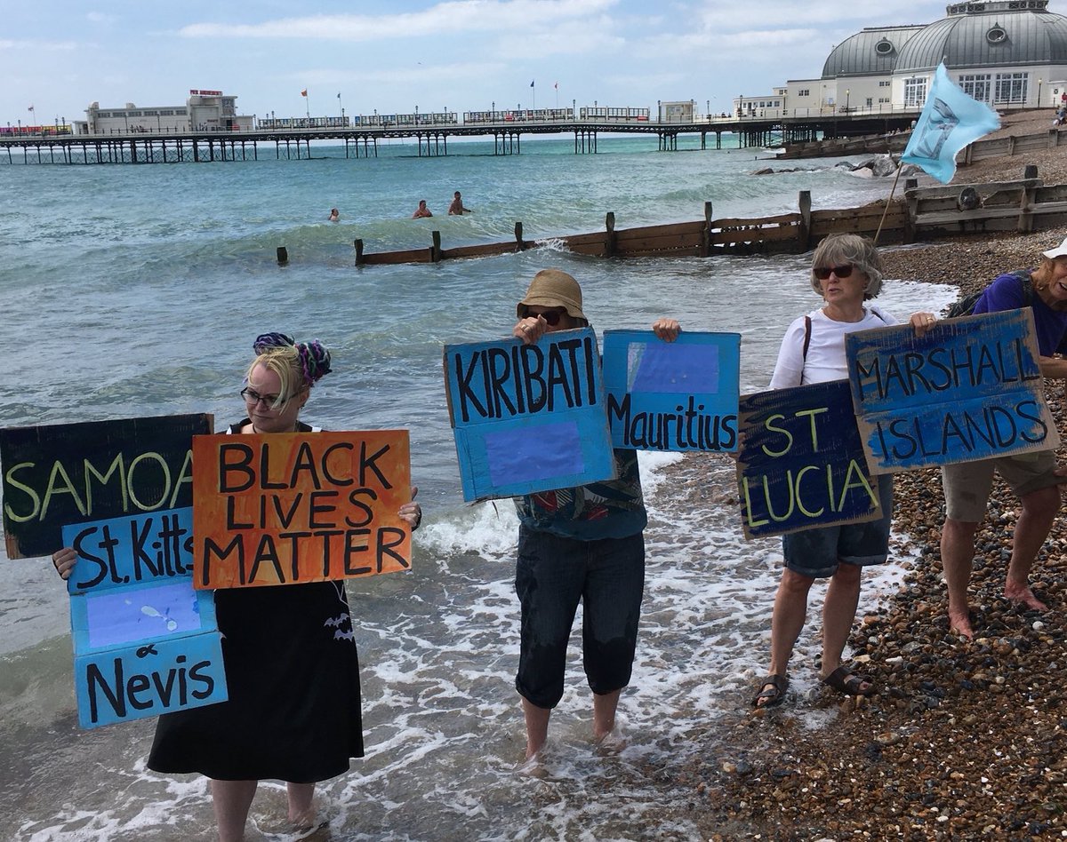 WorthingCan's tweet photo. On the day #Tuvalu calls for a Fossil Fuel Non Proliferation Treaty a look back to this great action by @XRWorthing last summer. #DrowningInPromises #LossAndDamage #EndFossilFuels #ClimateJustice @amberboutique @ClaireGrowsStuf @fossiltreaty https://t.co/2yBjFAZjgX