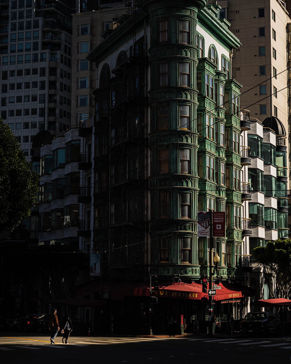 Dwarfed by a building