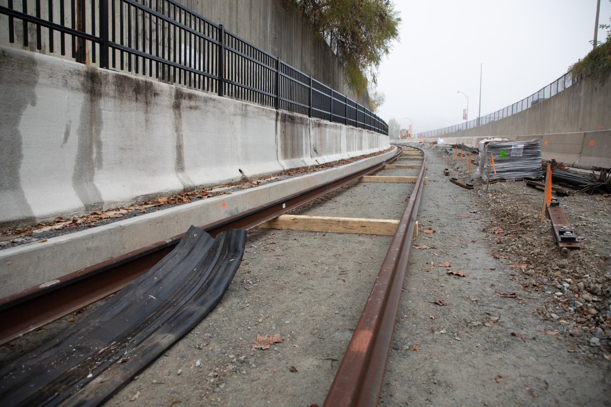 PurpleLineMD's tweet photo. Tracking progress! Crews install the 2nd pair of tracks in College Park under the @CSX @wmata tracks on Campus Dr. Next, crews will precisely position the track &amp; add reinforcing steel and concrete. Once done, vehicles will be able to drive over the embedded tracks. #MDOTscenes https://t.co/IYSpTof3nQ