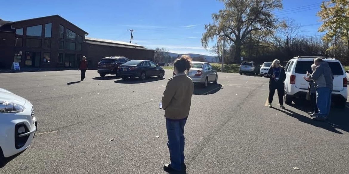 RDavidforSenate's tweet photo. It’s illegal to campaign within 100 feet of a voting location but that isn’t stopping my opponent and Citizen Action extremists from PAYING people to intimidate and harass voters at multiple sites. These paid workers are even handing out fake ballots with only Democrats listed. https://t.co/rtInUx5XQd