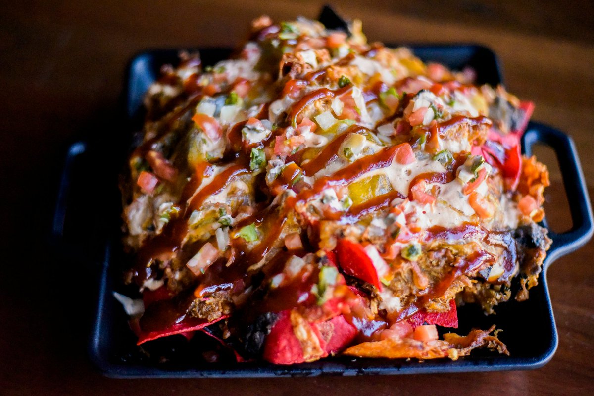 After you get your vote on, come on in for our signature BBQ Pulled Pork Nachos!

Slow-roasted pork shoulder piled high over tri-color chips and topped with queso, cheddar cheese, refried beans, pico de gallo, and a chipotle cream sauce.
popme.nu/pmebppn2?utm_c…