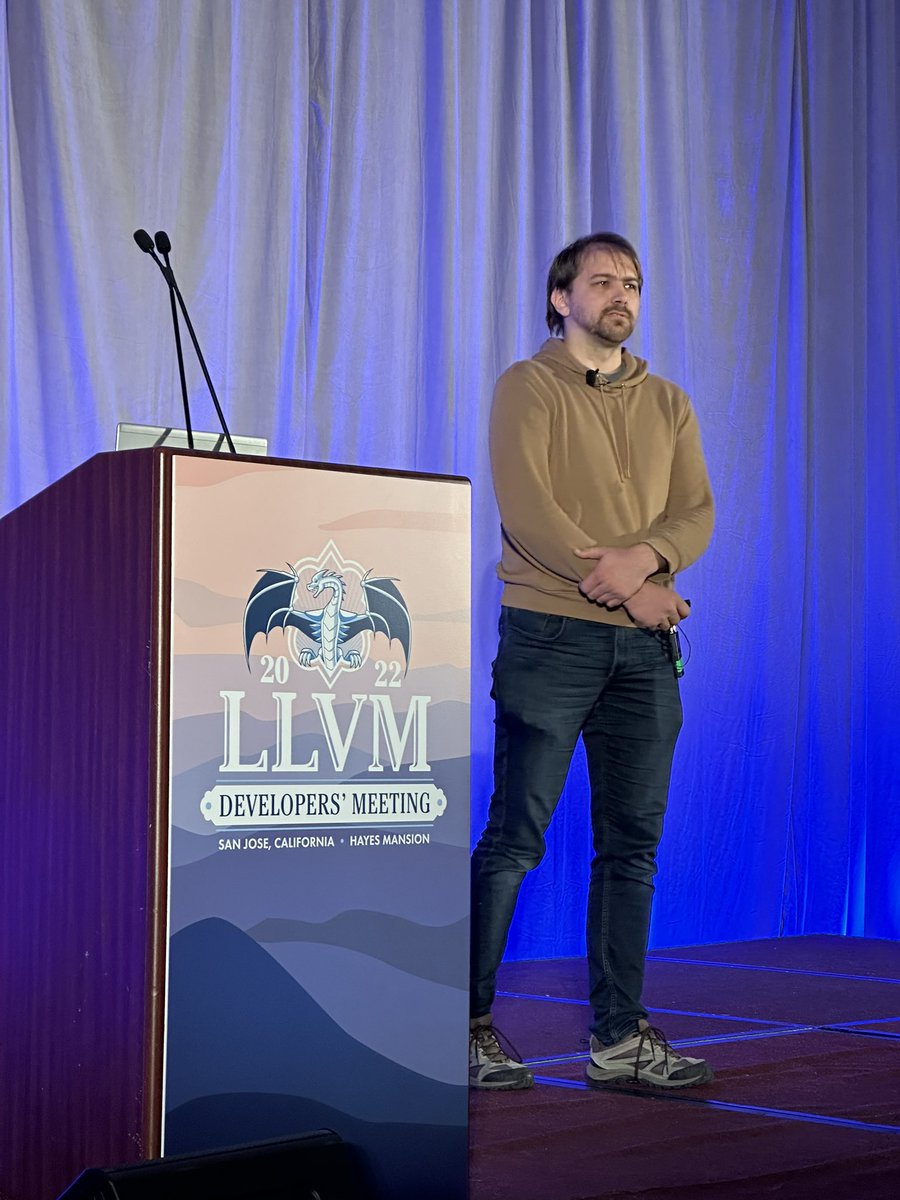 llvmorg's tweet image. The 2022 LLVM Developers’ meeting has begun!!! Our keynote today is “Paths towards unifying LLVM and MLIR” by Nicolai Hähnle #LLVM #LLVMDevMtg